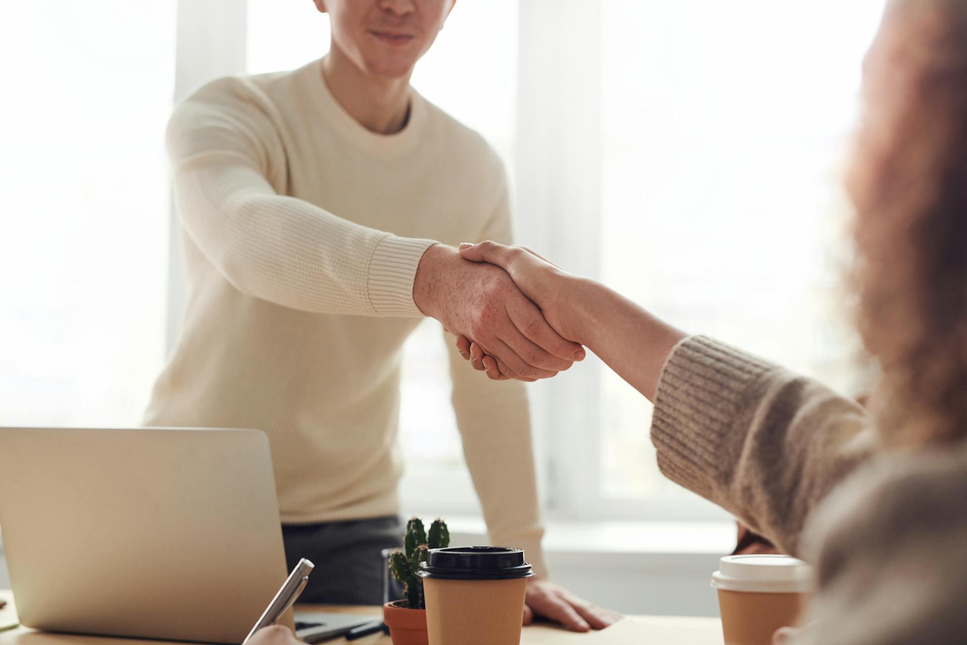 Business professionals in a meeting discussing funding options