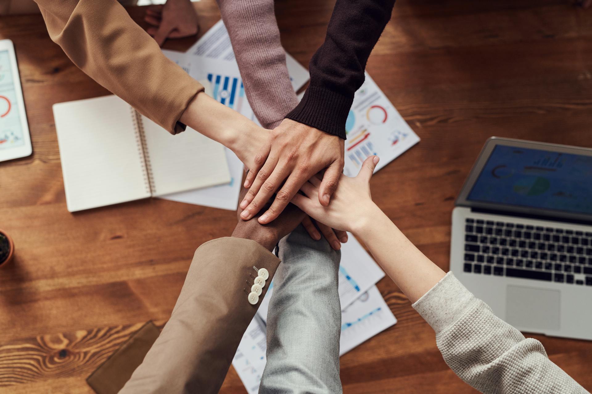 Business partners shaking hands in a professional setting